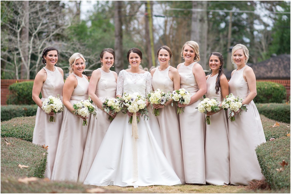 bride and bridesmaids in champagne floor length Alfred Sung bridesmaid dresses