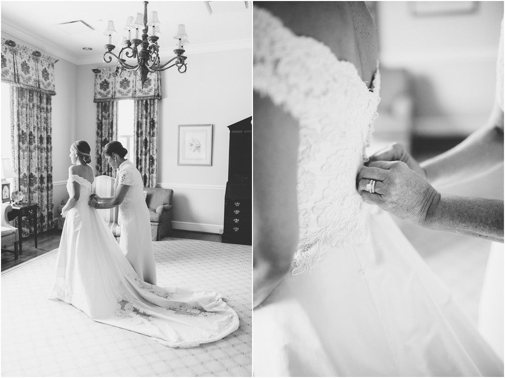 mom buttoning bride into dress