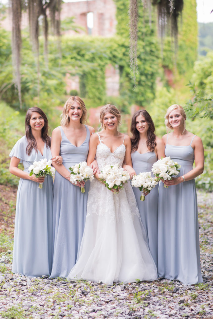 bride and bridesmaids with lavender color bridesmaid dresses