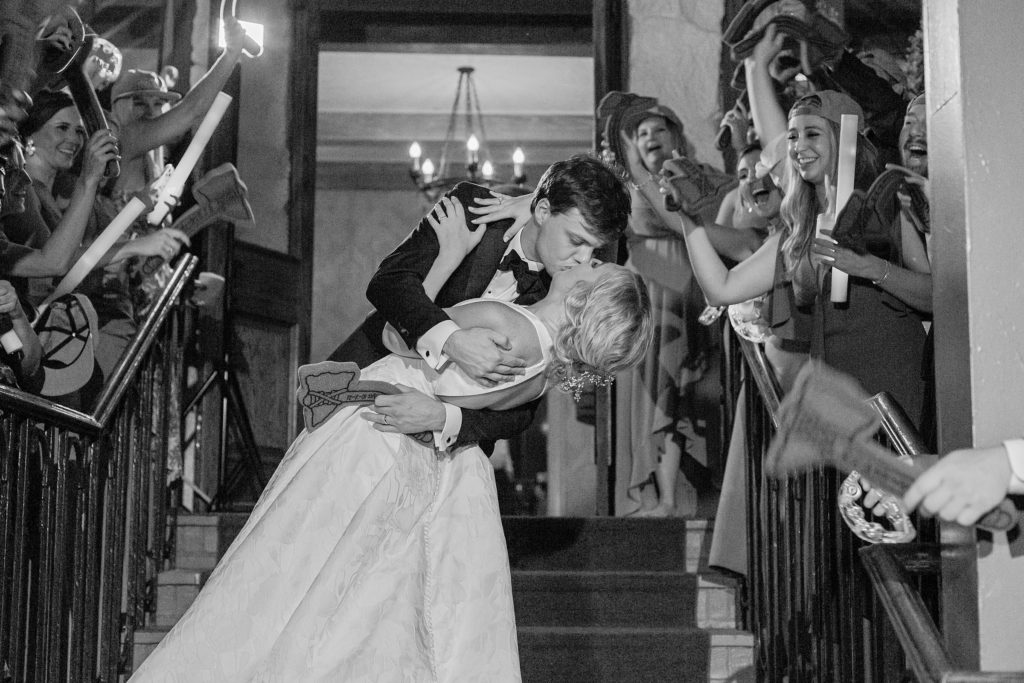 Columbus, Georgia Wedding - black and white exit photos with Braves tomahawk chop