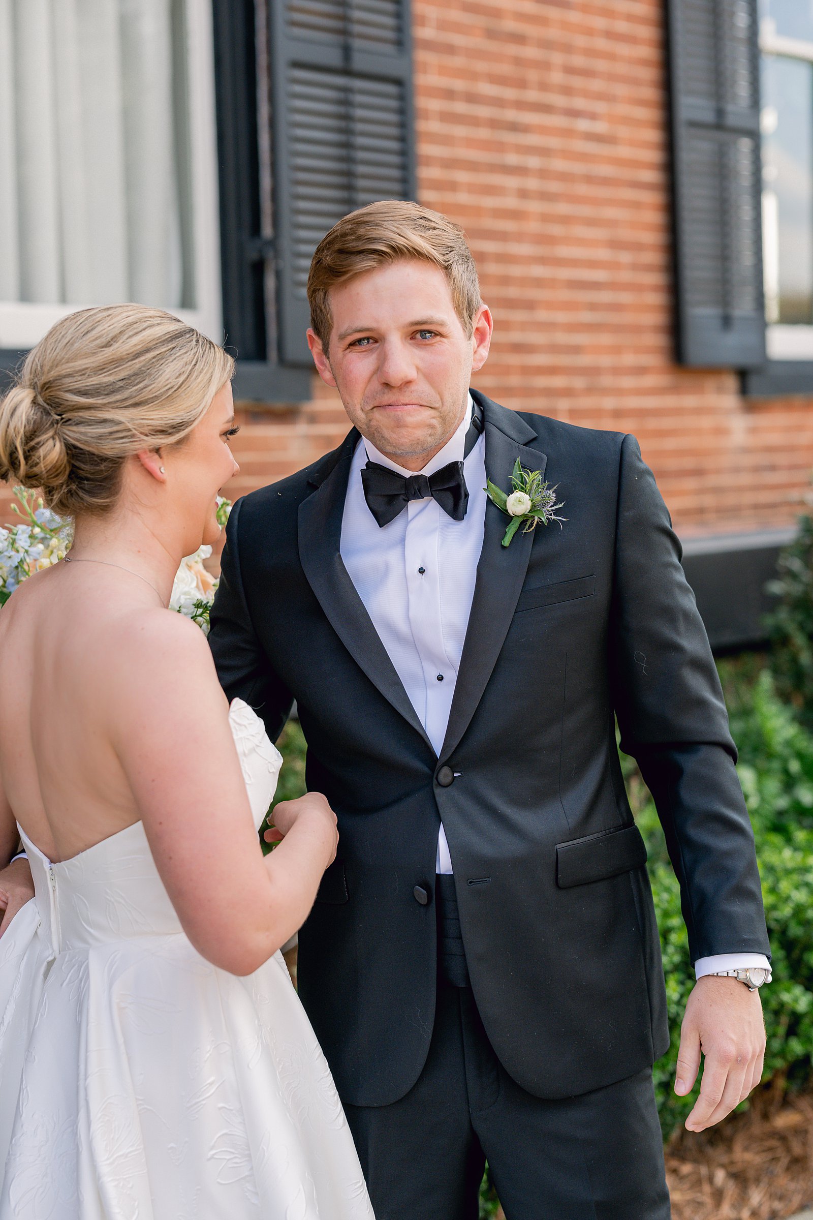 Outdoor Spring Wedding at the Big Eddy Club in Columbus, Ga groom crying during first look 