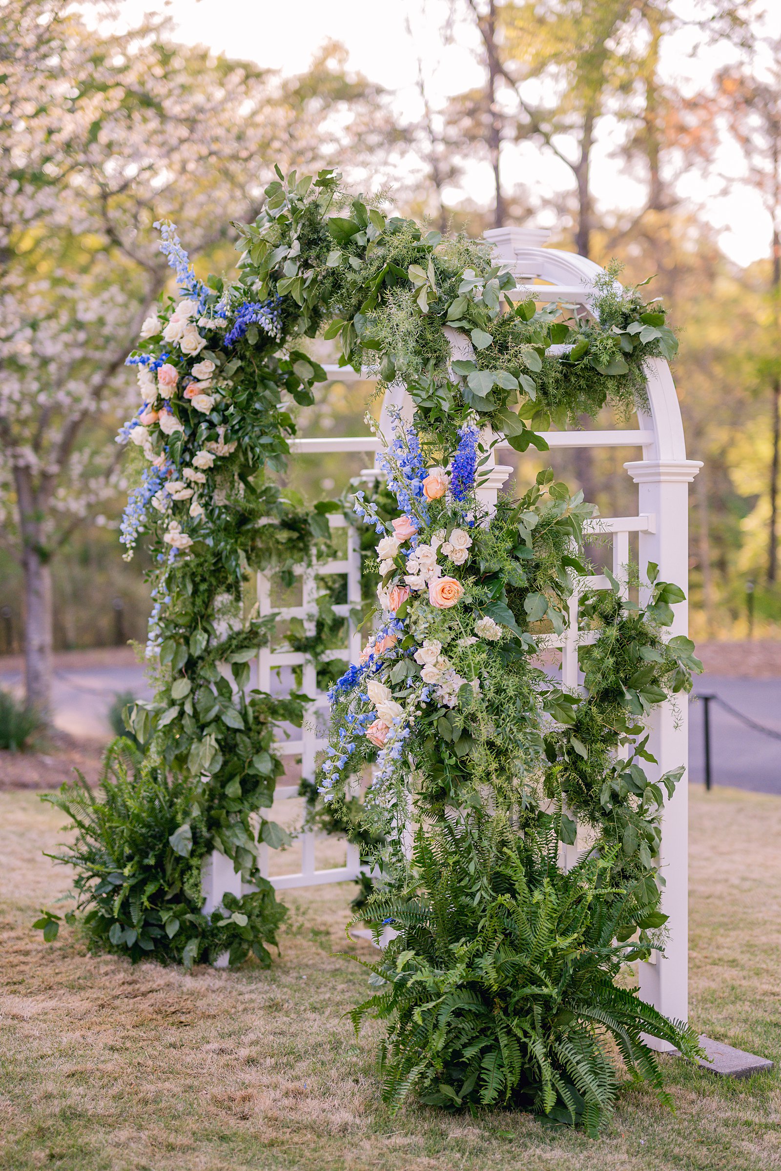 Outdoor Spring Wedding at the Big Eddy Club in Columbus, Ga stunning floral arch 